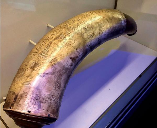 Engraved powder horn with the words '& Independence Liberty or Death' visible