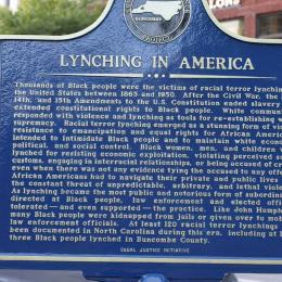 Lynching in America reverse of the Lynching of John Humphries Historical Marker in Pack Square Park