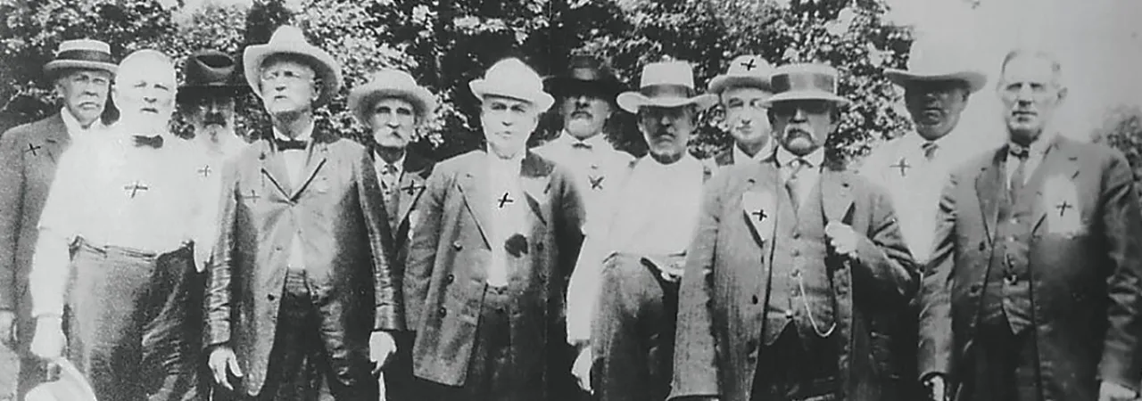 A black and white photo of Company F at the Gettysburg 50th Reunion