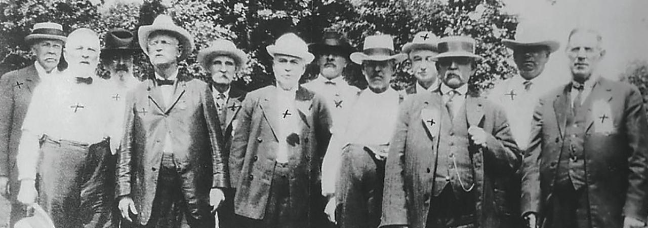 A black and white photo of Company F at the Gettysburg 50th Reunion