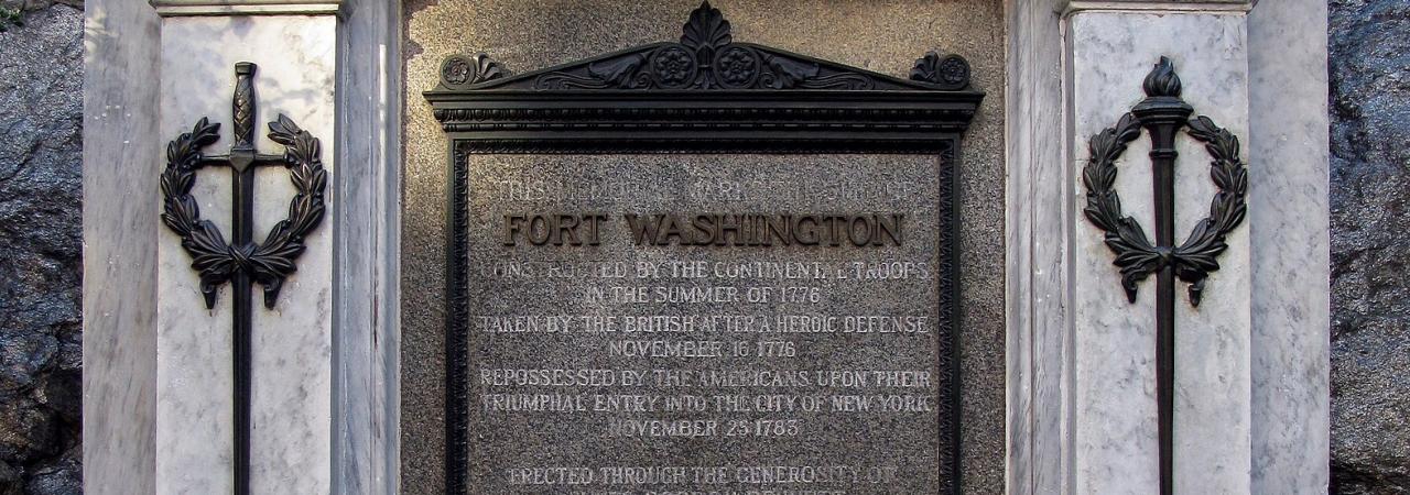 A marble, bronze, and granite stele commemorating the Battle of Fort Washington. 