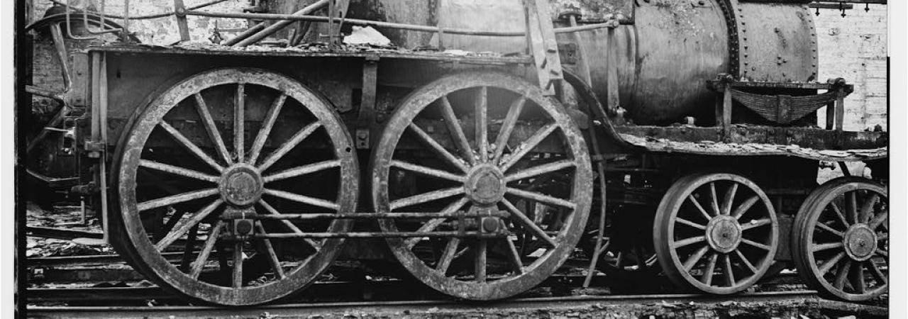 Black and white photograph a a damaged locomotive