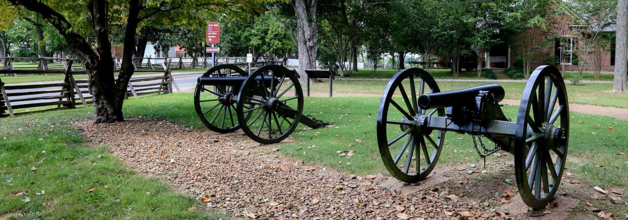 Two cannon sit aside a trail at the Franklin Battlefield in Franklin, Tenn.