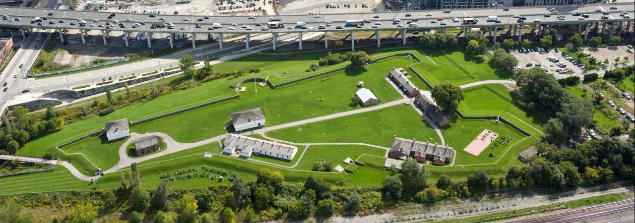 Photograph looking south over Fort York, the Gardiner Expressway and the Toronto Island Airport