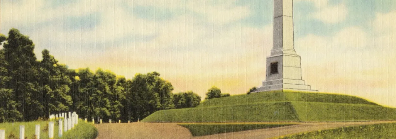 1930s-1940s Postcard of a white obelisk atop a hill.