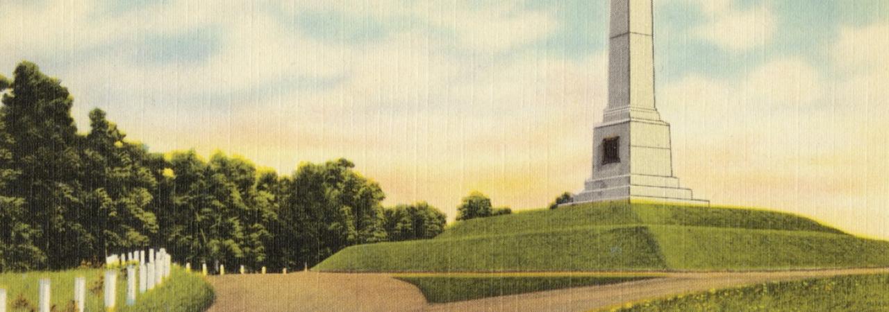 1930s-1940s Postcard of a white obelisk atop a hill.