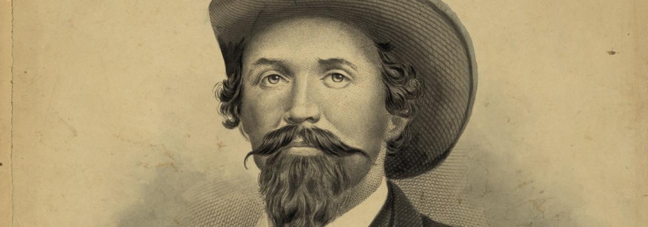 19th century portrait of man with a handlebar mustache wearing a western-type hat and a suit