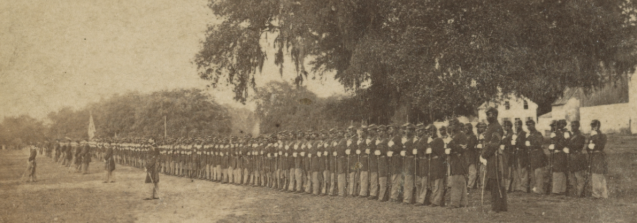 A photograph of the 29th Regiment, Connecticut Volunteers, U.S. Colored Troops, in formation near Beaufort, S.C.