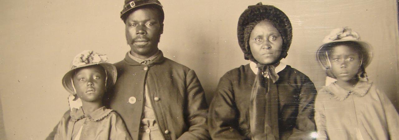 An African American soldier and his family