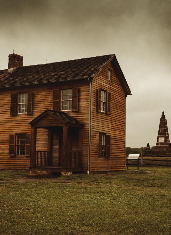 A historic house and monument on Second Manassas Battlefield