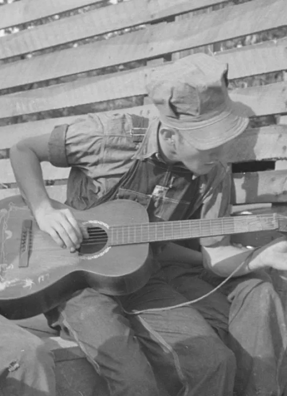1937 Photograph of a young guitarist in the back of a truck in Alabama, LOC