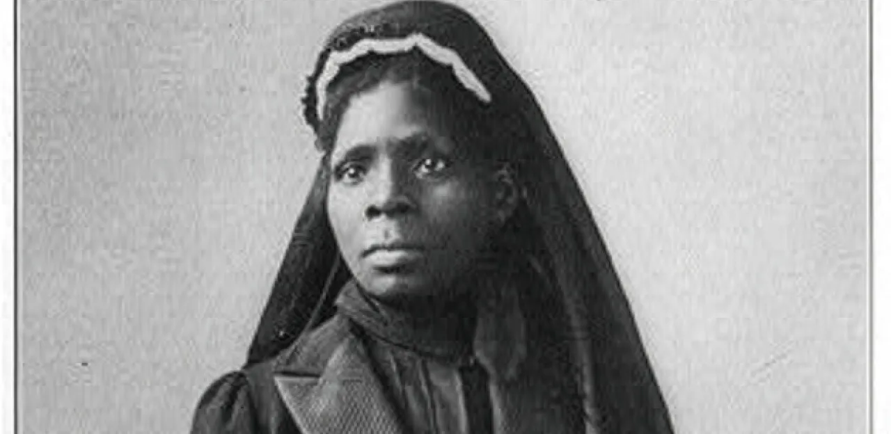 A black and white photograph of Susie King Taylor