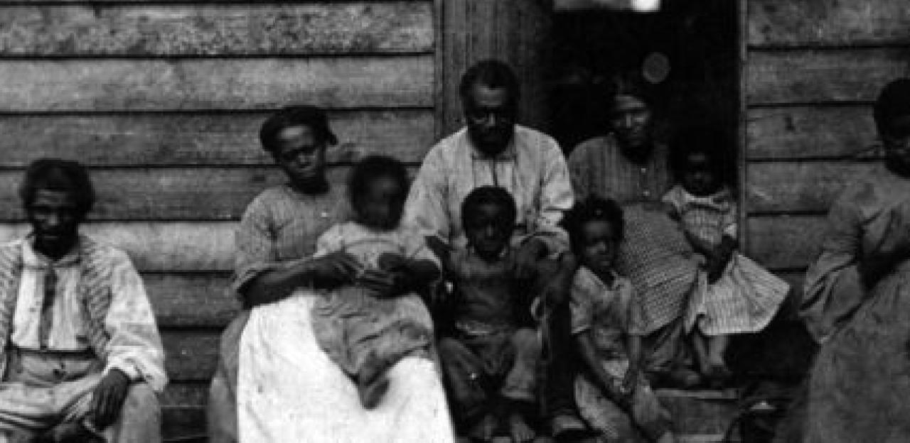 Photograph of slaves out front of Dr. William Gaines' house