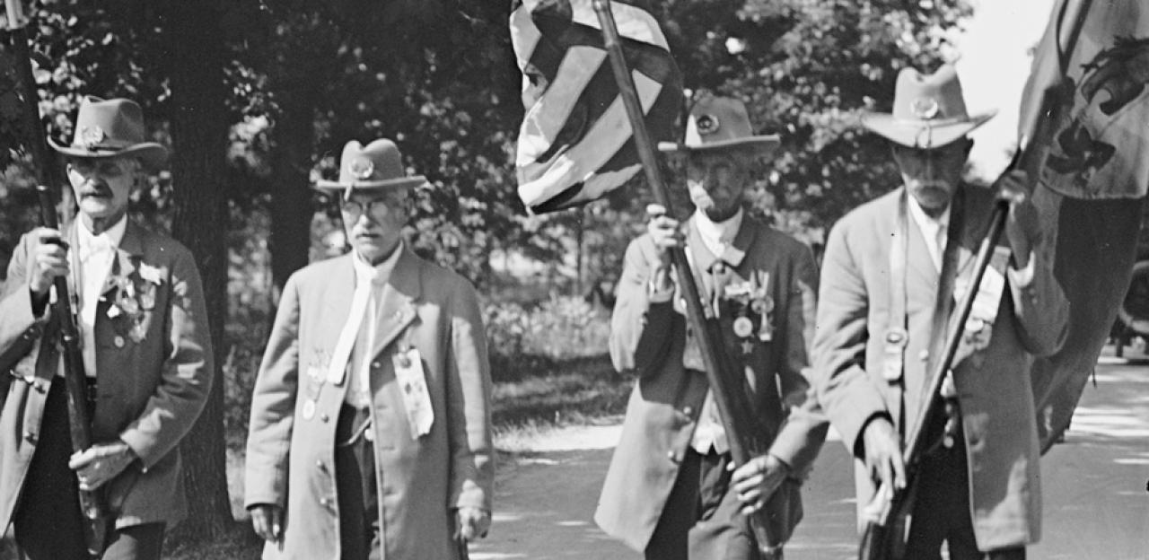 Veterans marching with flags