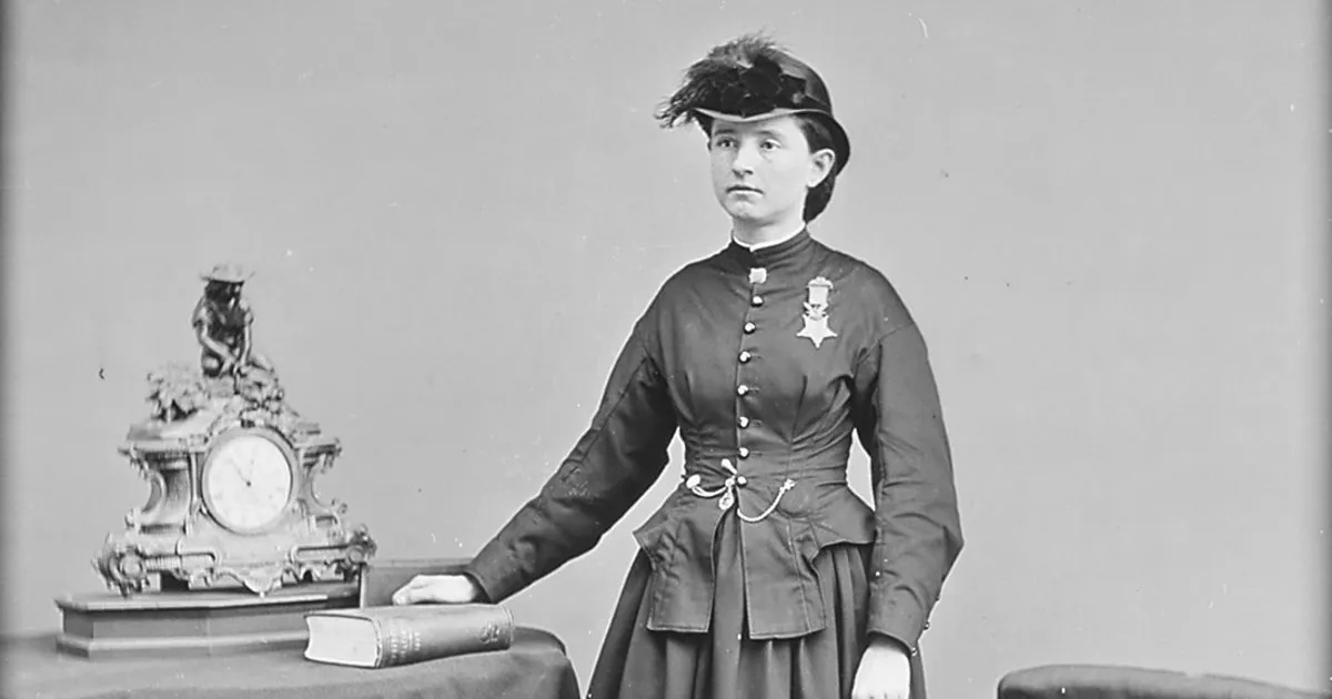 Dr. Mary Edwards Walker poses for a photo, wearing her Medal of Honor