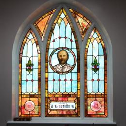 Stained glass at Alfred Street Baptist Church depicting Reverend Madden