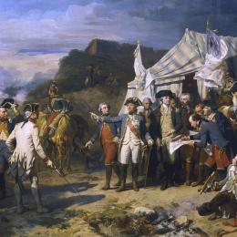 Historical painting depicting George Washington and allied French commanders, including the Comte de Rochambeau and Marquis de Lafayette, during the 1781 Siege of Yorktown.