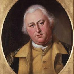 Portrait of of a man with white hair wearing a blue and buff uniform coat of the Continental Army. 