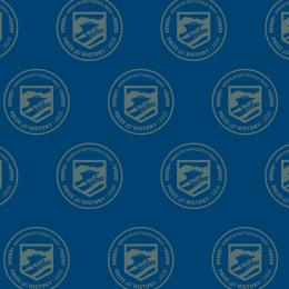 Navy background with gold logo emblazoned. 