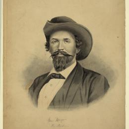 19th century portrait of man with a handlebar mustache wearing a western-type hat  and a suit