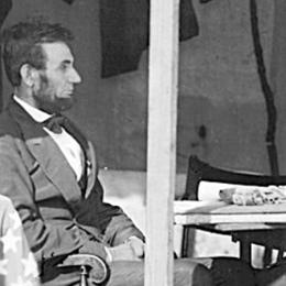 This image depicts Abraham Lincoln sitting and pondering with George McLellan.