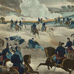 Union and Confederate troops engage in combat at Gettysburg. 
