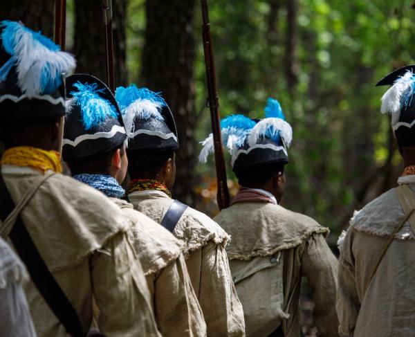 Reenactors portray Black soldiers during the Revolutionary War