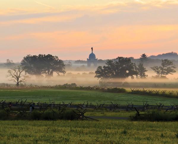 The Pennsylvania Monument in the morning mist at Gettysburg National Military Park