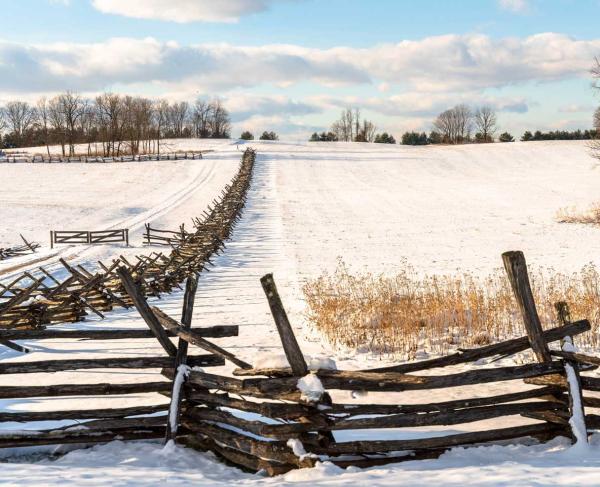 Snowy field and fence line at Harpers Ferry National Memorial Park