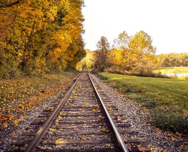 Train tracks leads into the distance along the Cuyahoga Valley Scenic Railroad