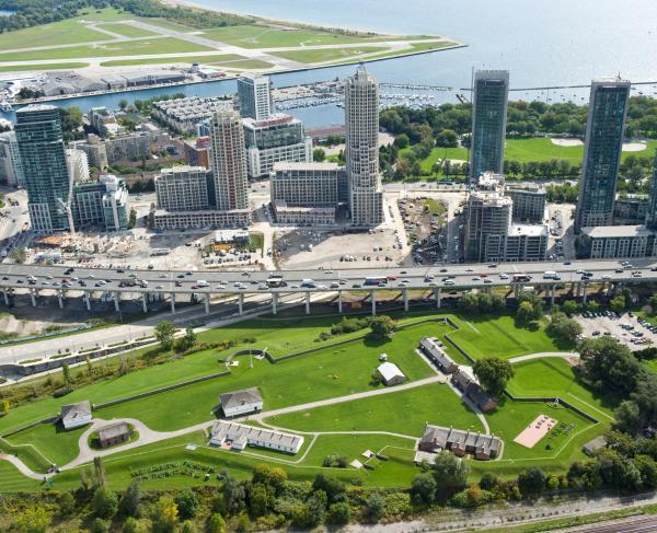 Photograph looking south over Fort York, the Gardiner Expressway and the Toronto Island Airport