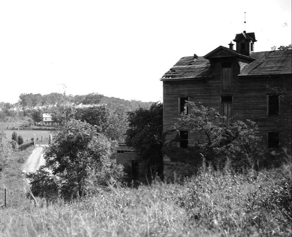Ca. 1930 photograph looking south from Sudley Mill toward our latest target tract directly across the early 20th-century bridge over Catharpin Run.