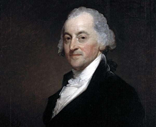 Portrait of a man with powdered white hair and a black coat. 