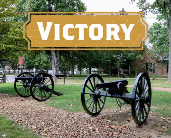 Two cannons sit beside a path at Franklin Battlefield