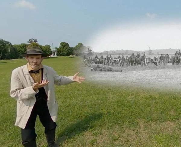 Garry Adelman at Antietam with a historic photo of Captain J.M. Knap's Penn. Independent Battery "E" Light Artillery