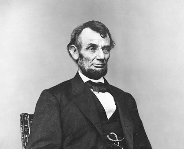 This photo offers a headshot of Abraham Lincoln. 