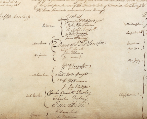 Signatures on a document. 