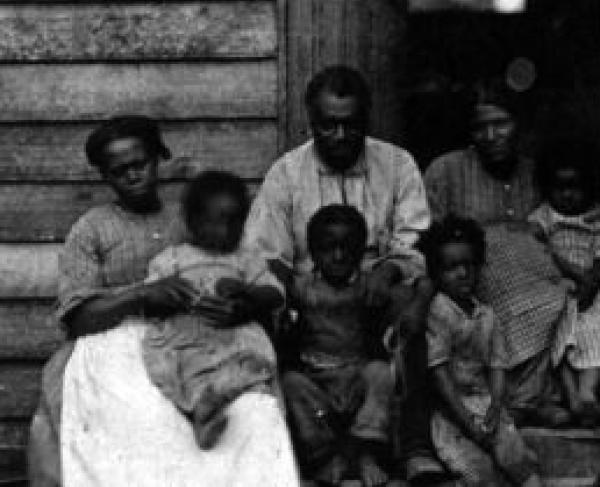 Photograph of slaves out front of Dr. William Gaines' house