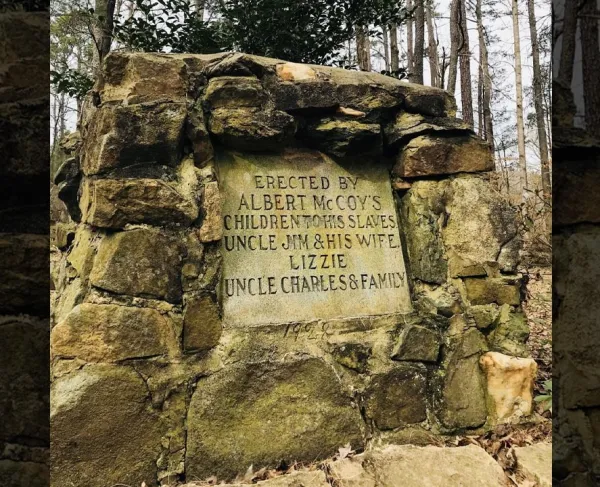 1928 marker placed by McCoy descendants at McCoy Slave Cemetery, Huntersville, N.C.