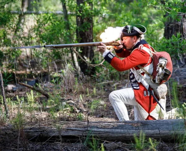 British soldier firing a musket