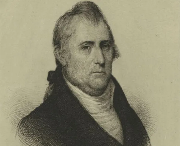 A black and sepia engraving of a man wearing a black jacket. 