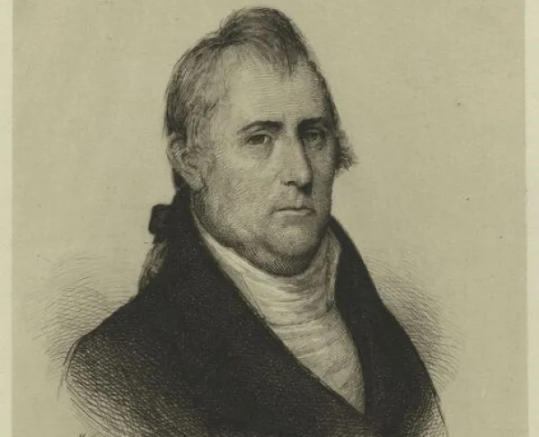 A black and sepia engraving of a man wearing a black jacket. 