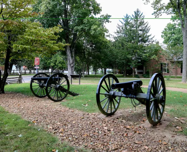 Two cannon sit aside a trail at the Franklin Battlefield in Franklin, Tenn.