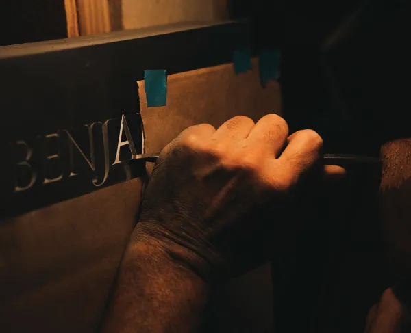 Paul Russo v-cutting one of the French officers' grave markers