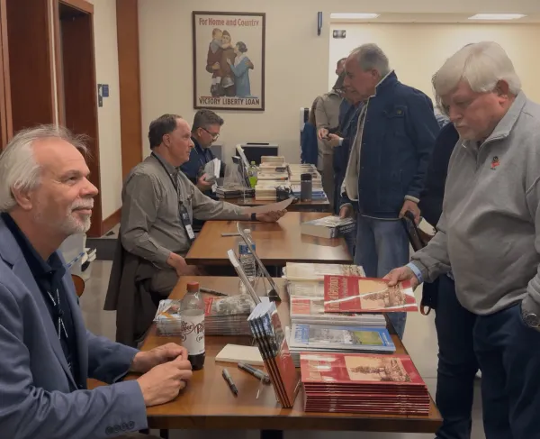 Tim Smith, Scott Hartwig, and Chris Mackowski signing