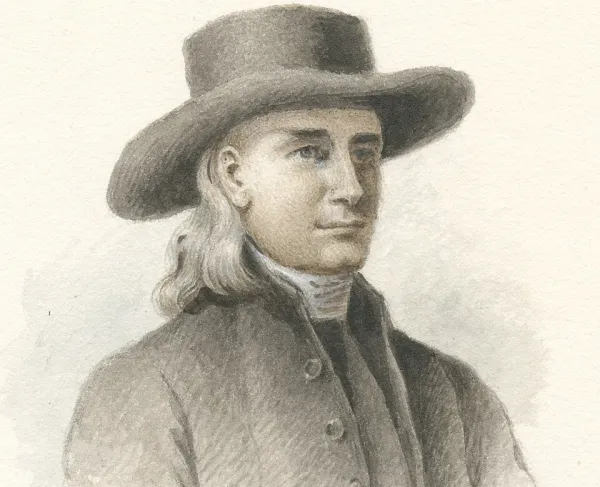 A man wearing a top hat and a coat with long hair. 