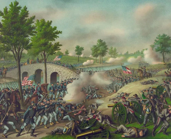 Color lithograph depicting Union and Confederate troops engaged in battle at Antietam, with infantry and artillery fighting across the landscape.