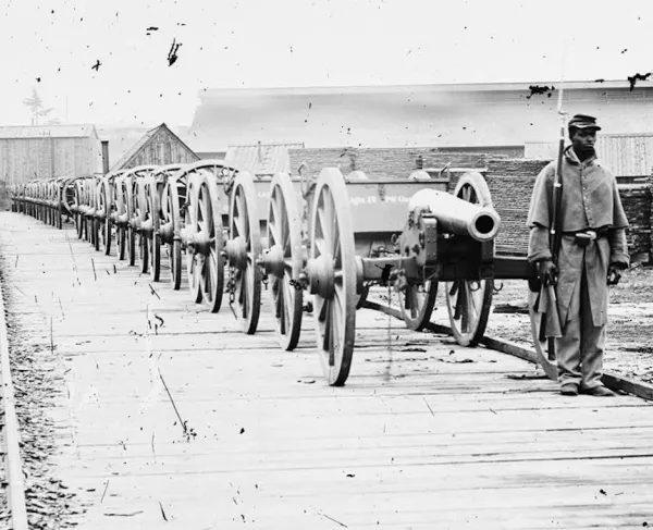 City Point, Virginia. African American soldier guarding U.S. Model 1857 12-pdr. Napoleon.