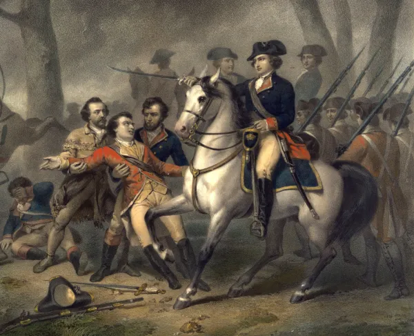 Man atop a horse leading soldiers into battle. 