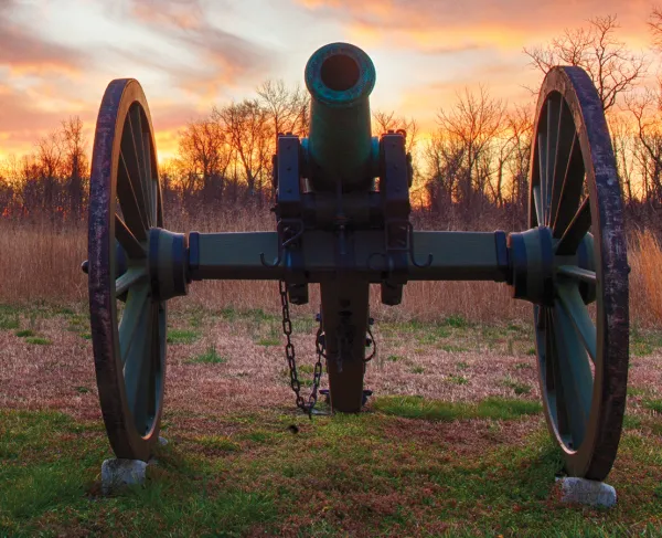 Photograph of a cannon with a vibrant sunset in the background at Gaines' Mill Battlefield, Hanover County, Va.